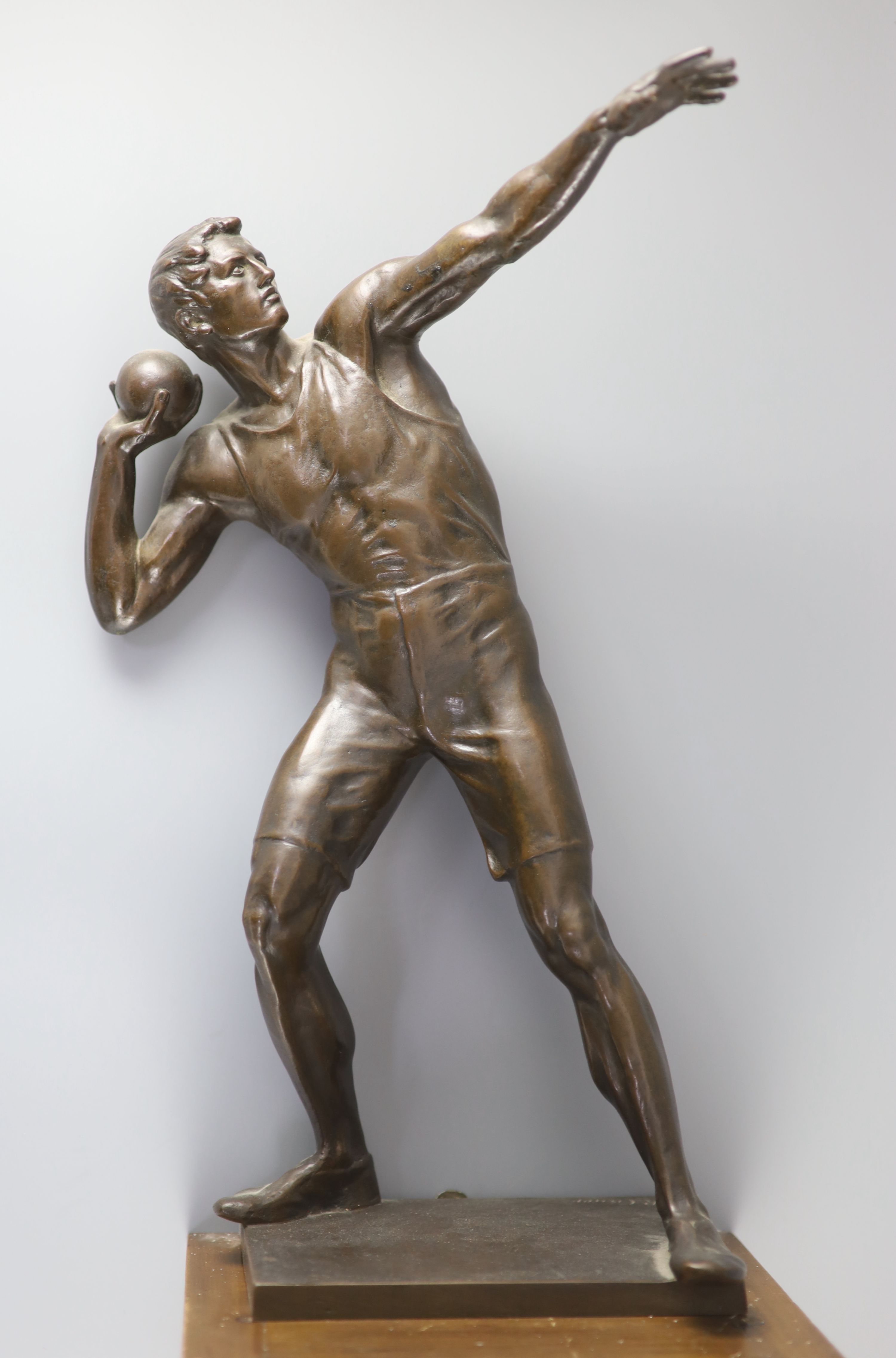 After Robert Cauer (1863-1947) a bronze figure of a shot-putter, c.1925